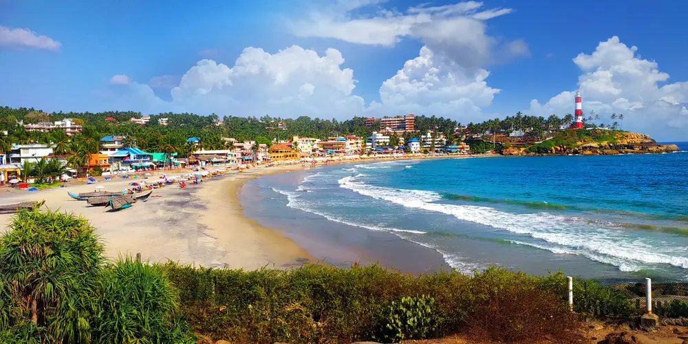 Kovalam beach curving round towards the lighthouse